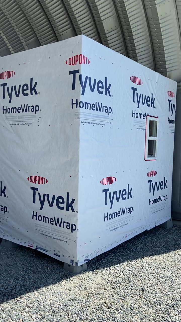 Video of a bunkie wrapped in house wrap
