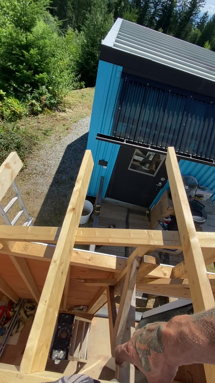 Video of Korey framing a bunkie roof