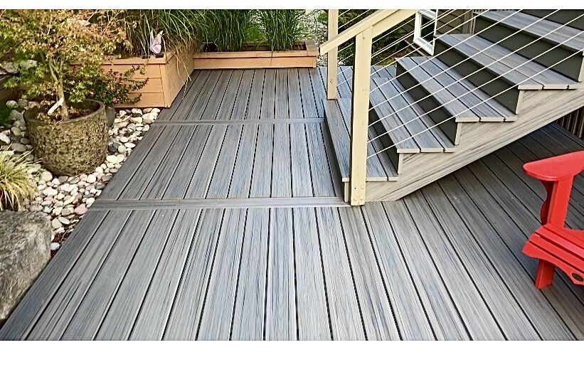 Composite deck with stairs and planters